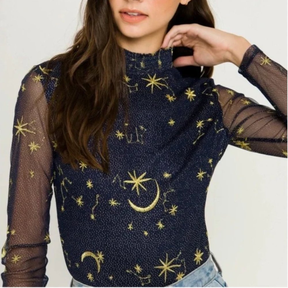 Free people baby bodysuit with stars and moons and sheer sleeves never worn